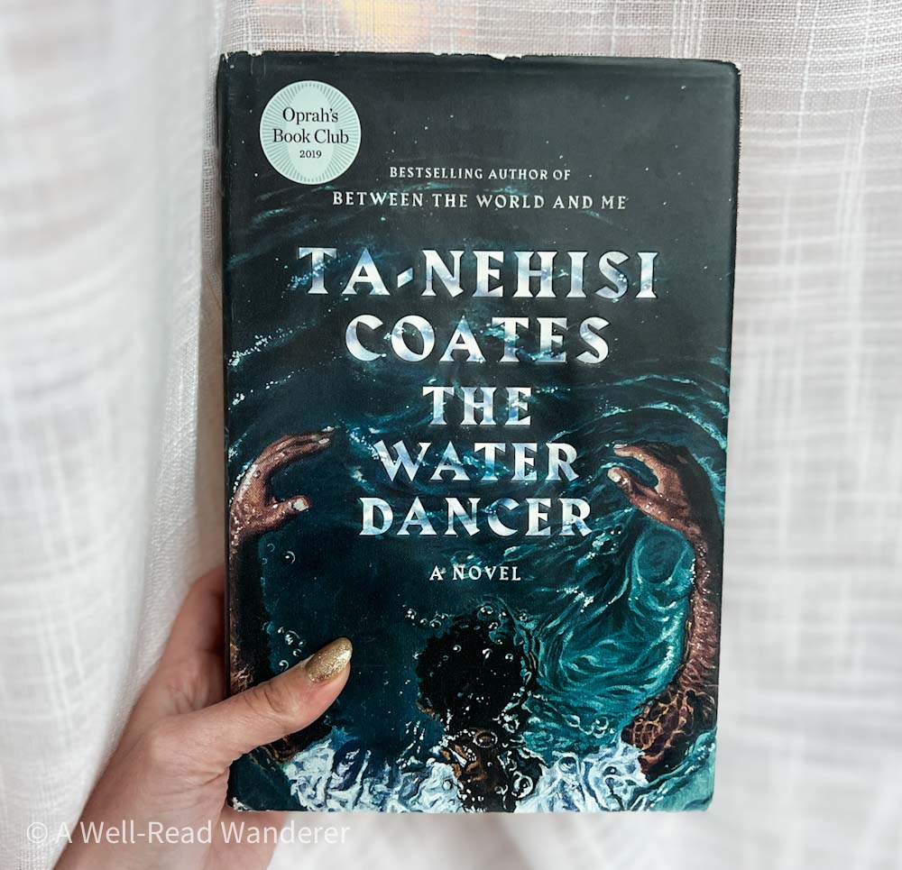 the water dancer by ta-nehisi coates contemporary black writer held in front of a white curtain