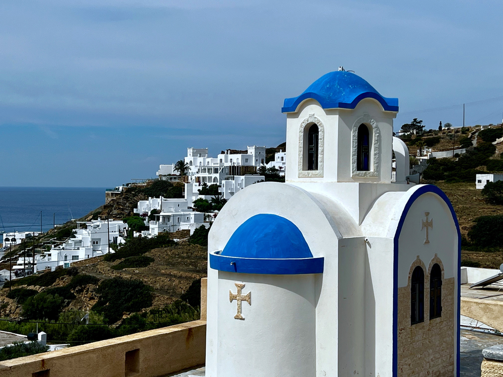 Ios, Greece has plenty of the blue-domed churches that crowds of tourists seek out in Santorini and Mykonos homer's tomb ios island greece homer's odyssey death of homer where to find blue domes greece