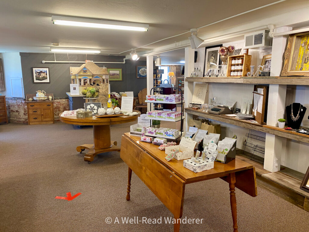 john steinbeck house gift shop, wooden tables with merchandise on display