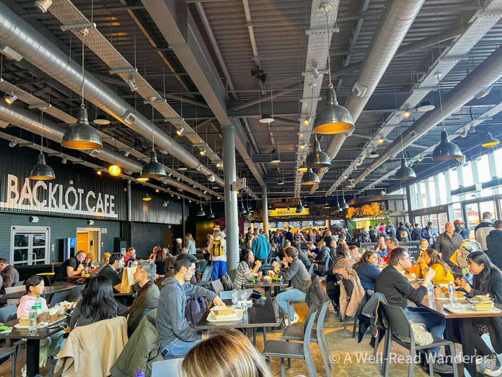 stopping point in the harry potter london studio tour, a cafeteria where people can buy food and sit and eat