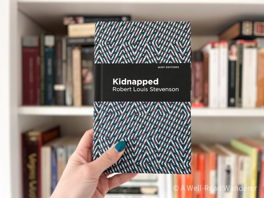 kidnapped by robert louis stevenson held in front of a bookshelf, scottish novels
