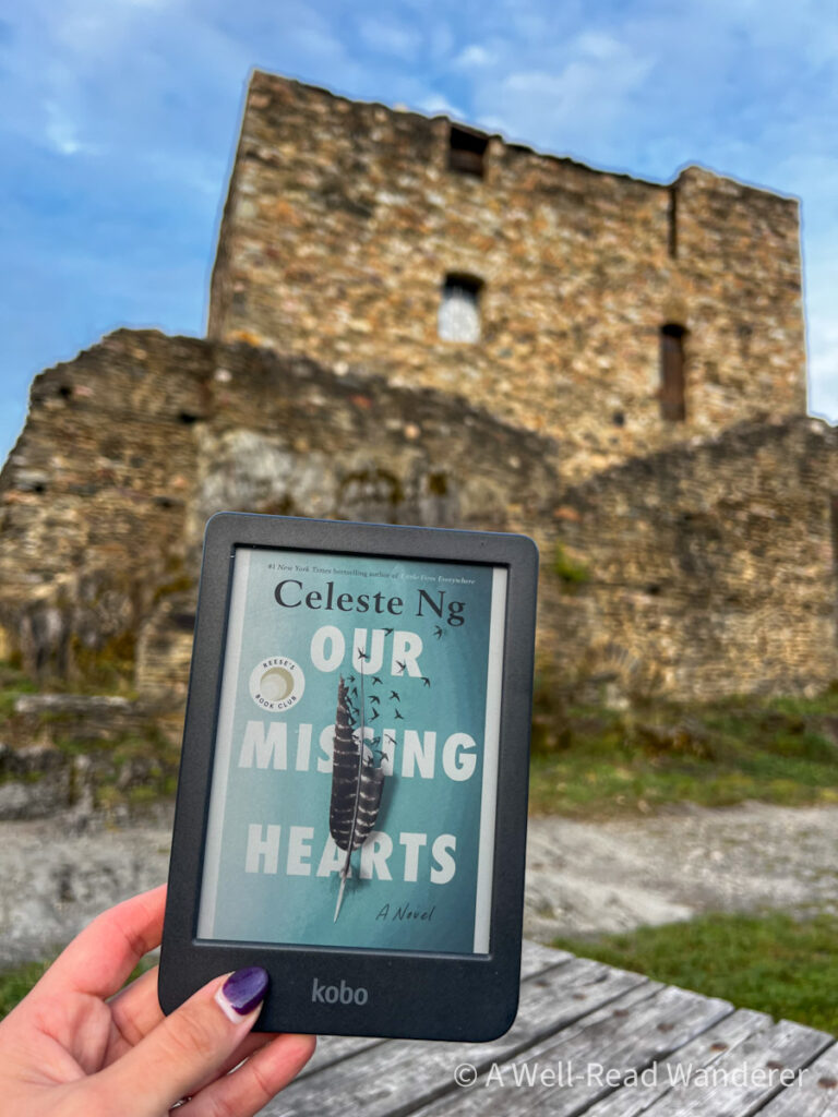 kobo clara colour 2e review with cover of our missing hearts in front of castle ruins