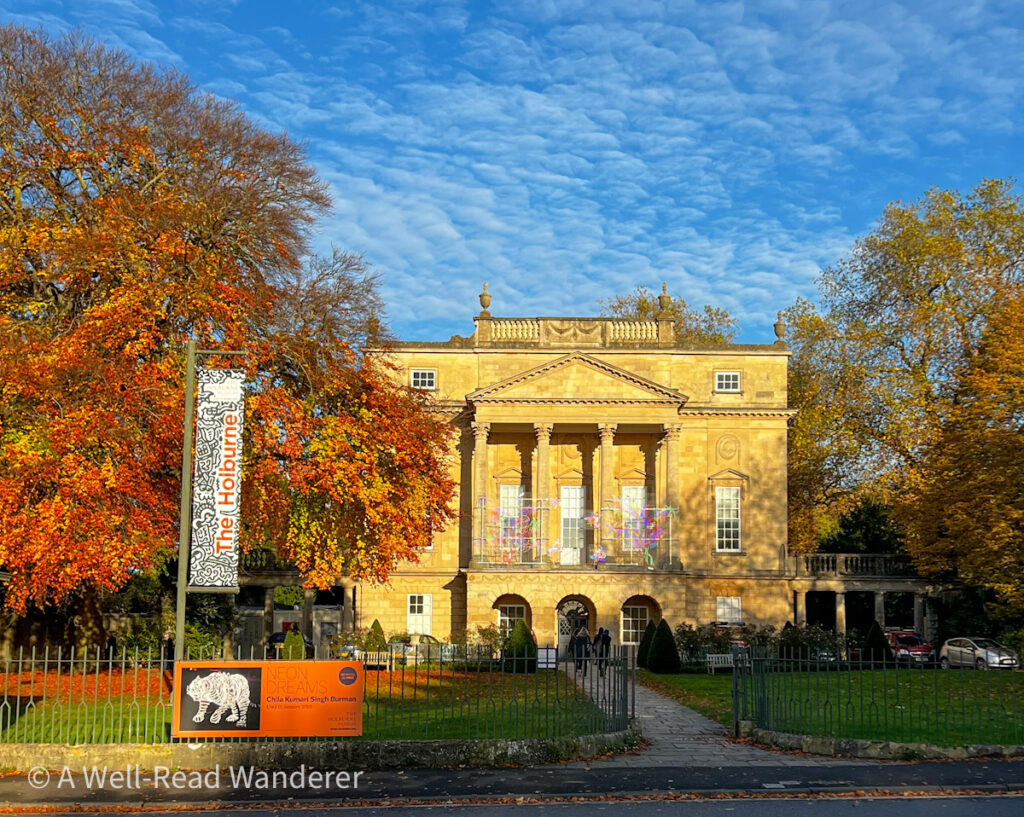 exterior of holburne museum formery sydney hotel a georgian building with pillars and autumnal trees in foreground