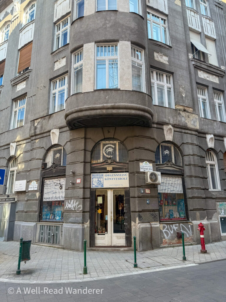 di-plant foreign language bookstore budapest exterior with gray stone corner building